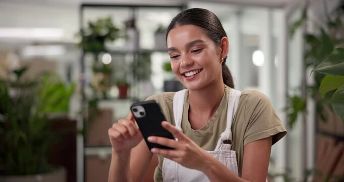 Text, smile and florist woman with phone in small business for online order, social media and ecommerce. Happy, good news and flower seller with mobile message in plant nursery for retail startup