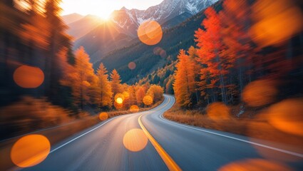 Driving through a vibrant autumn landscape with sunlit mountains and winding roads in the distance.
