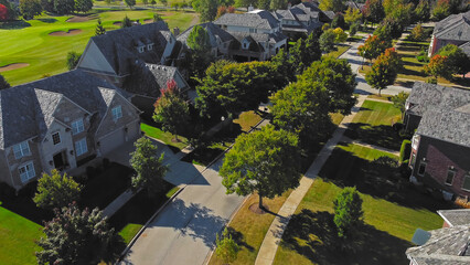 Aerial view of suburban neighborhood near a golf course in Chicago. © Iryna
