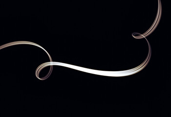 Abstract light swirl creates a captivating pattern on a dark background enhancing visual intrigue and depth in design