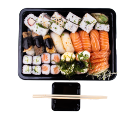 full sushi tray delivery japanese food close up portrait with soy sauce and chopsticks transparent background top view