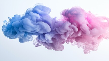 Colorful swirling smoke formation creates an abstract visual display in a light setting