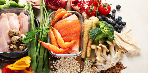Healthy food background. Many different healthy food on table.