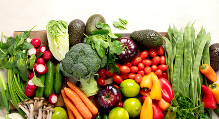 Assortment of fresh organic vegetables in rainbow colors.