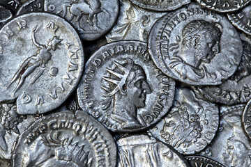 Multiple Roman silver coins showing different Roman emperors