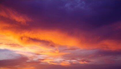 Fototapeta premium orange and purple background autumn or fall warm colors in blurred cloudy sky illustration sunrise or sunset with stormy cloud design abstract colorful background with blur texture