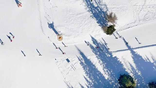 Aerial drone view of a ski resort in Col dei Baldi, Alleghe, in the Dolomites, Italy in daylight