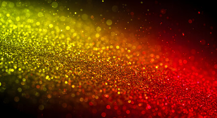 Abstract golden yellow and red particle background with sparkling glitter effects creating warm luminous gradient bokeh pattern