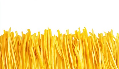 Closeup Of Yellow Pasta Strings Against White Background