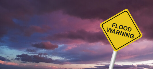 Hurricane Idalia warning sign against a powerful stormy background with copy space. Dirty and angled sign with cyclonic winds add to the drama.hurricane season sign on cloudy background
