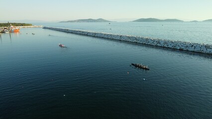 Drone aerial view of natural park, seaside, port