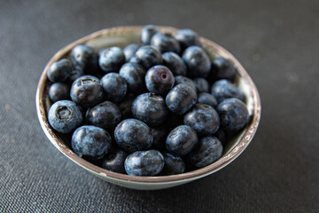 blueberry ripe juicy berries vitamins natural product snack fresh tasty food dish gourmet food background on the table rustic food top view copy space keto and paleo diet Vegetarian and vegan food