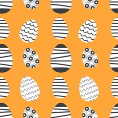 Easter seamless pattern with abstract black and white eggs. Vector design.