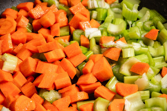 braising carrot celery and onion to prepare italian soffritto -