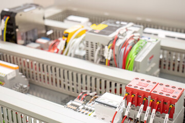 Industrial electrical control panel with wiring and components
