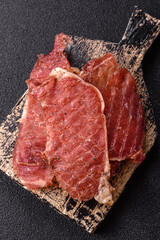 Jerky, dried pork meat slices with salt and spices