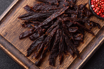 Jerky, dried horse meat or beef slices with salt and spices