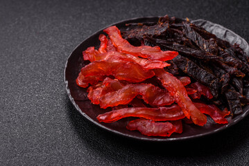 Jerky, dried chicken slices with salt and spices