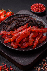 Jerky, dried chicken slices with salt and spices