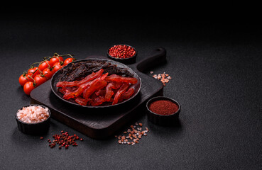 Jerky, dried chicken slices with salt and spices