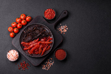 Jerky, dried chicken slices with salt and spices