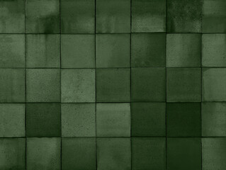 Dark morocco green terracotta ceramic tiles cladding texture for interior, exterior wall, dividing wall, facade, yard, floor. Natural handmade tinted outdoor square clay slabs background.