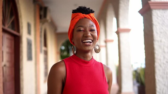 Young garifuna woman smiling and expressing happiness in honduras
