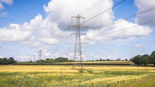 Electricity pylons in countryside landscape, UK National Grid