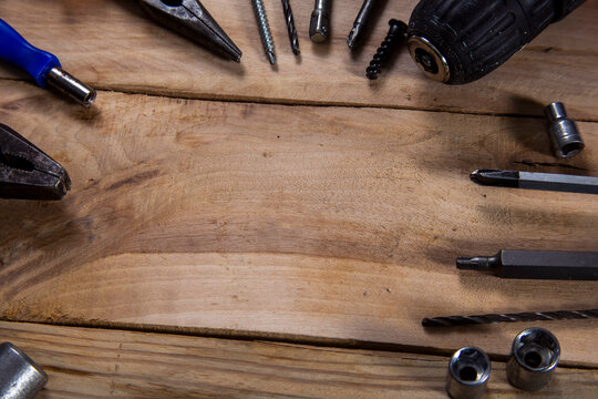 Old carpentry work tools on a  wooden table background. - Powered by Adobe