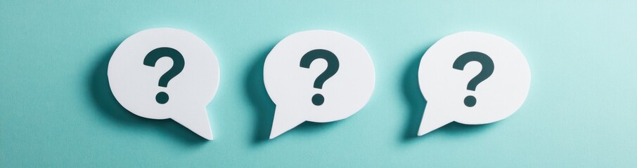 Three white speech bubbles with question marks, on a solid turquoise background, in a flat lay photography style Generative AI