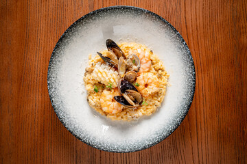 Delightful Seafood Risotto Crafted With Fresh Ingredients, Showcasing Vibrant Colors and Textures in a Fine Dining Setting.