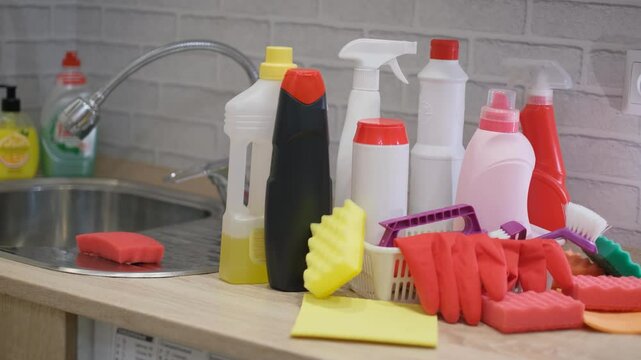 Various kitchen cleaning products in plastic bottles