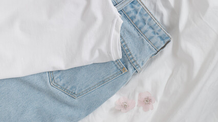 Minimalist Denim Jeans and t-shirt on Bed – Casual Fashion, Wardrobe Organization, and Cozy Home Aesthetics