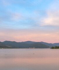 Beautiful mountain range with a calm lake in the foreground