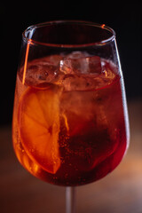 A beautiful bright cocktail. Restaurant, a glass with a drink is on the table
