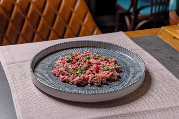Risotto with red wine and veal served in a restaurant