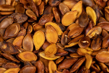 ripe pumpkin seeds fried to brown and golden