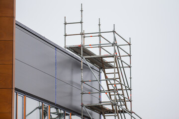 Scaffolding tower aluminium tower for facade building of warehouse building. Aluminum tower of...