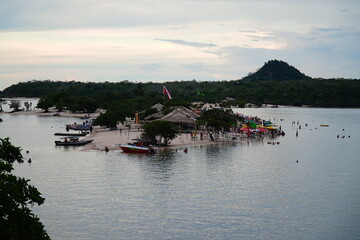 Panoramic view of the Tapajos River under a cloudy evening sky. The island of love in Alter do...