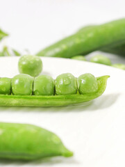 green peas on a white background 