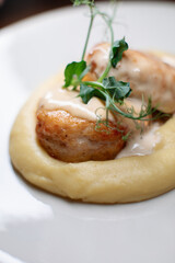 Delicious cutlets with airy mashed potatoes served in the restaurant. The perfect photo for a menu, culinary blog, or an advertisement for catering establishments.