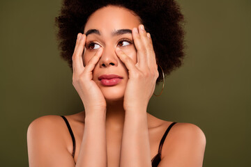 Fototapeta premium Close up photo of pretty charming lady salon procedure anti wrinkles complex isolated on khaki color background