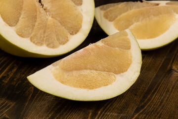 ripe pomelo with lots of pulp cut into pieces