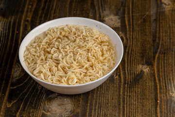 details of flour noodles with eggs during cooking