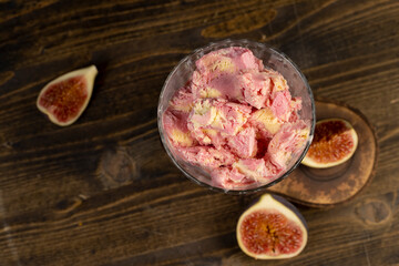 creamy sweet ice cream and sliced red fig fruits