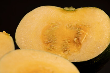 soft ripe orange pumpkin cut into several pieces