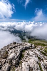 Breathtaking View From Mountain Peak Surrounded By Clouds and Blue Sky : Generative AI