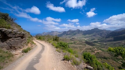 Breathtaking Mountainous Landscape with Winding Road Under Blue Sky and White Clouds : Generative AI