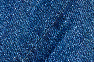 Naklejka premium new blue denim fabric for the production of clothing and other items