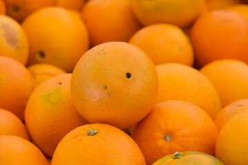 Close up on navel oranges for sale at Farmers Market